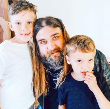 Sorin Reid Coppola Cage with his father Weston Cage and brother Lucian Augustus Coppola Cage.
